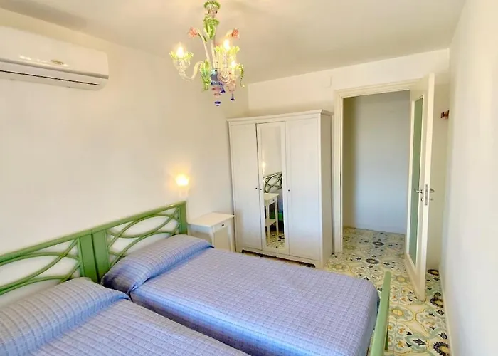 Amalu Piscina E Giardino